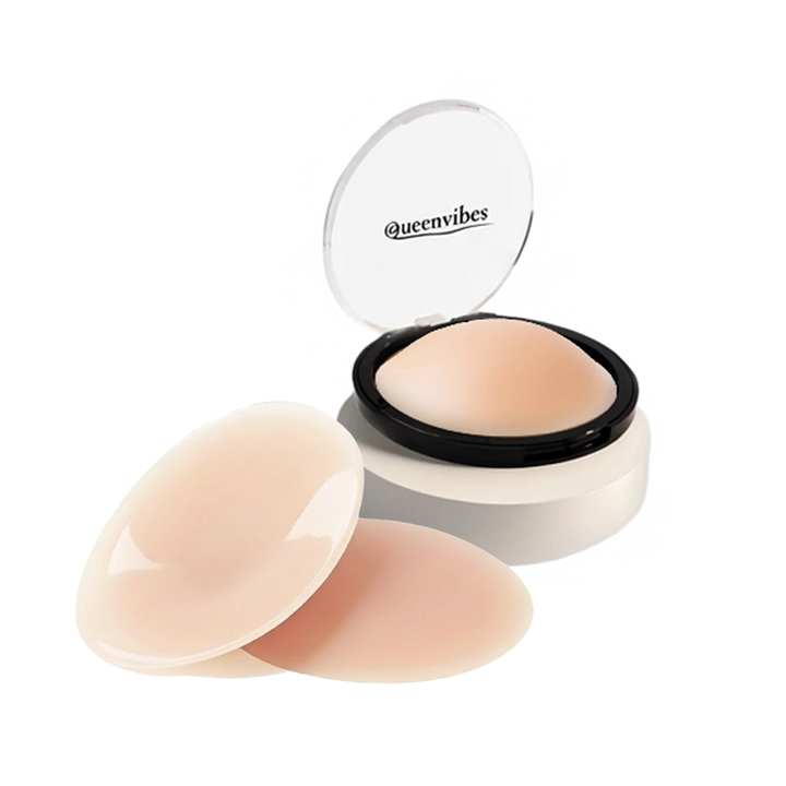Compact powder with a clear lid featuring 'queenvibes' branding on a white background.